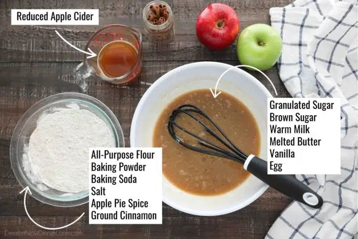 Ingredients for baked apple cider donuts: Dry ingredients (flour, baking powder, baking soda, salt, apple pie spice, cinnamon), wet ingredients (white sugar, brown sugar, milk, butter, vanilla, egg) and reduced apple cider.