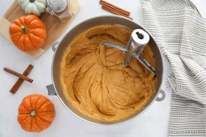 Pumpkin cake batter in mixing bowl.