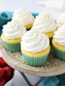 Stabilized Whipped Cream piped on top of cupcakes.