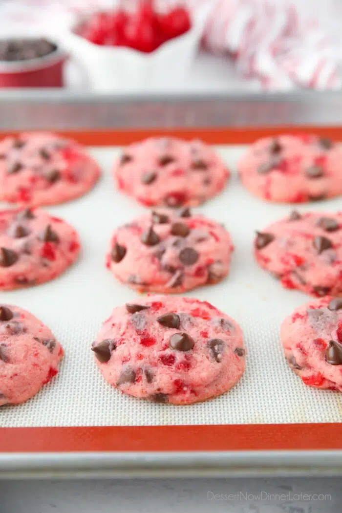 Cherry Chocolate Chip Cookies on a cookie sheet.