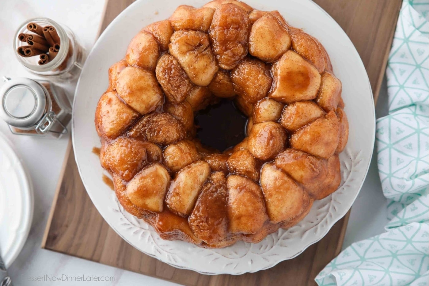 Top view of sticky warm monkey bread on a plate.