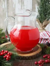 Pitcher with red Christmas punch.