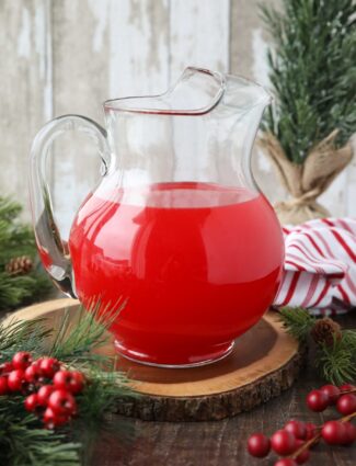 Pitcher with red Christmas punch.