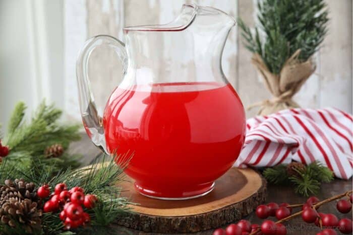 Pitcher of red non-alcoholic holiday punch.