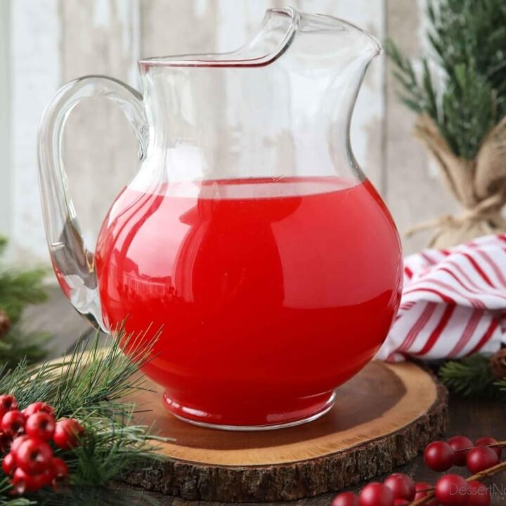 Pitcher of red non-alcoholic holiday punch.