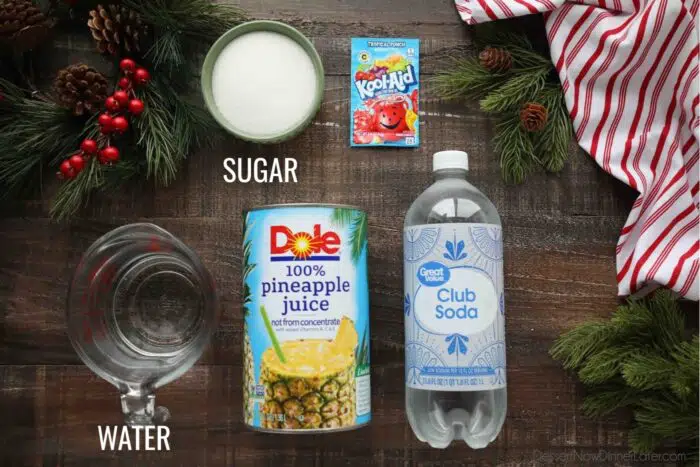 Ingredients for red holiday punch for Christmas: Tropical Punch Kool-Aid mix, granulated sugar, cold water, pineapple juice, and club soda.