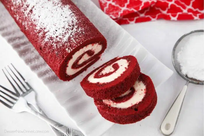 Two slices of red velvet roulade.