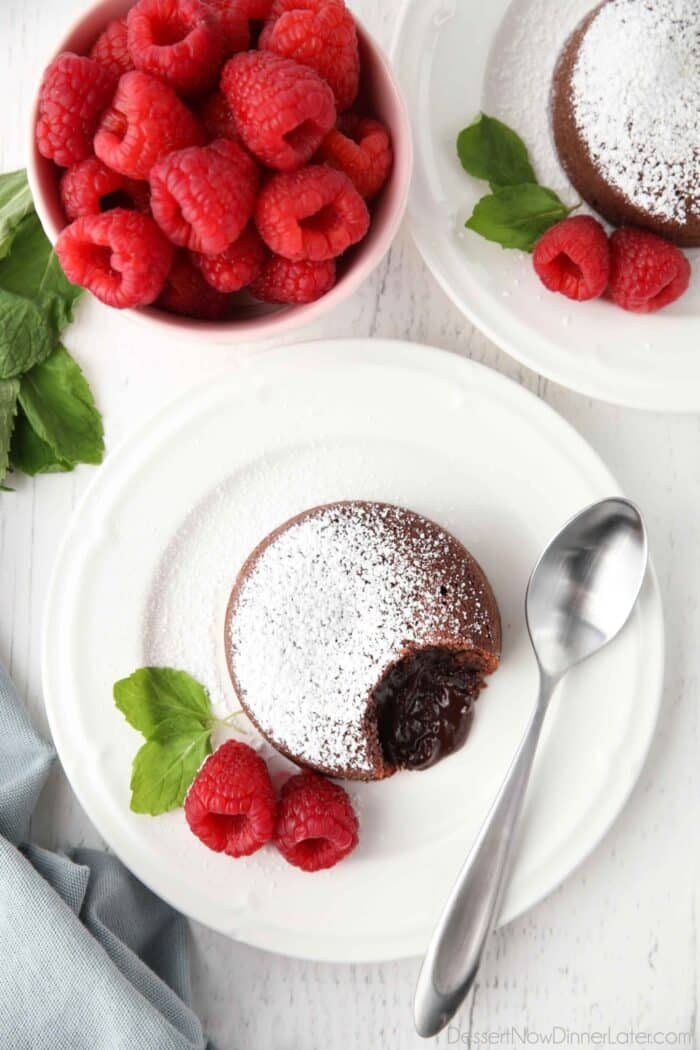 Top view of lava cake on plate with soft chocolate center.