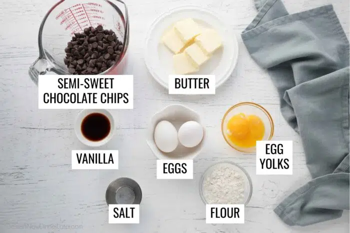 Recipe ingredients for Chocolate Lava Cakes: Semi-sweet chocolate chips, butter, vanilla, eggs, egg yolks, salt, and flour.