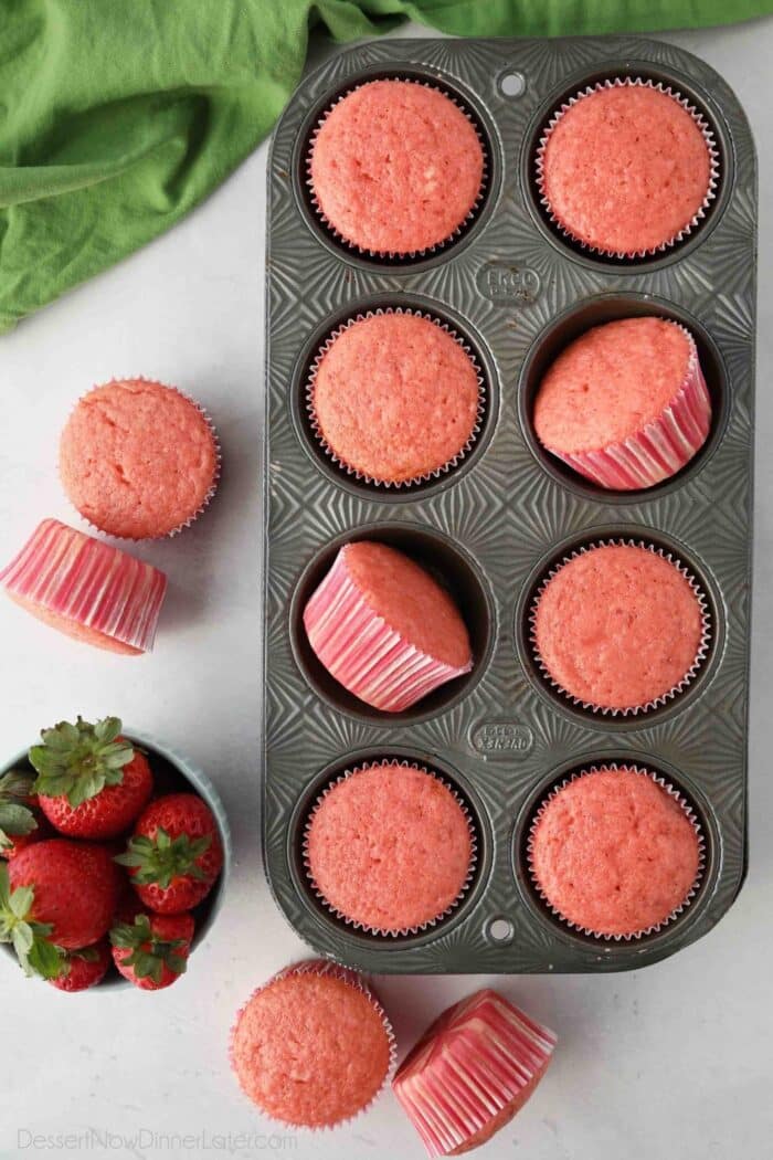 Strawberry Cupcakes in a muffin pan.
