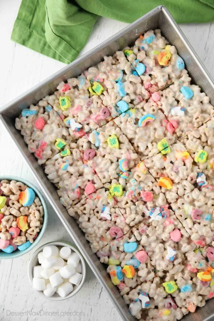 Top view of a pan of marshmallow treats made with Lucky Charms cereal.