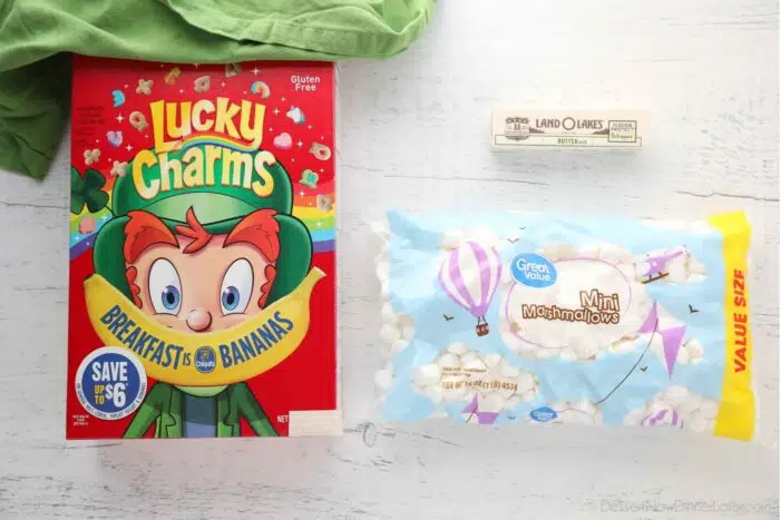 Ingredients for Lucky Charms Treats: Lucky Charms Cereal, Salted Butter, and Mini Marshmallows.