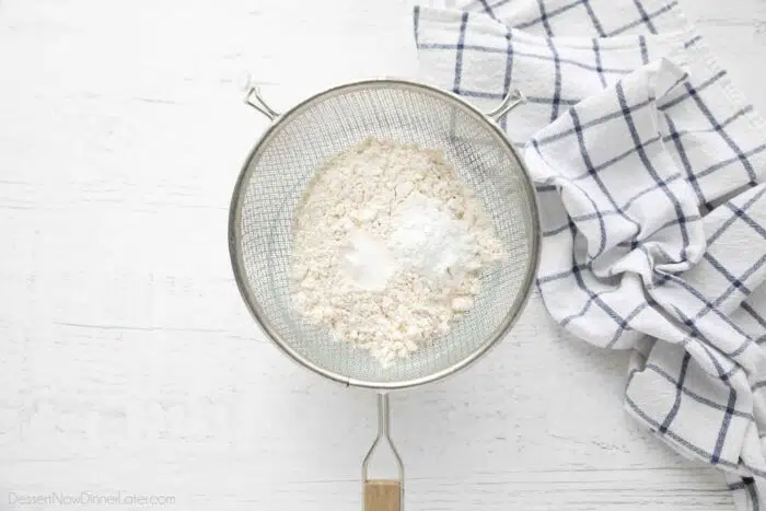 Dry ingredients in a fine mesh sieve.