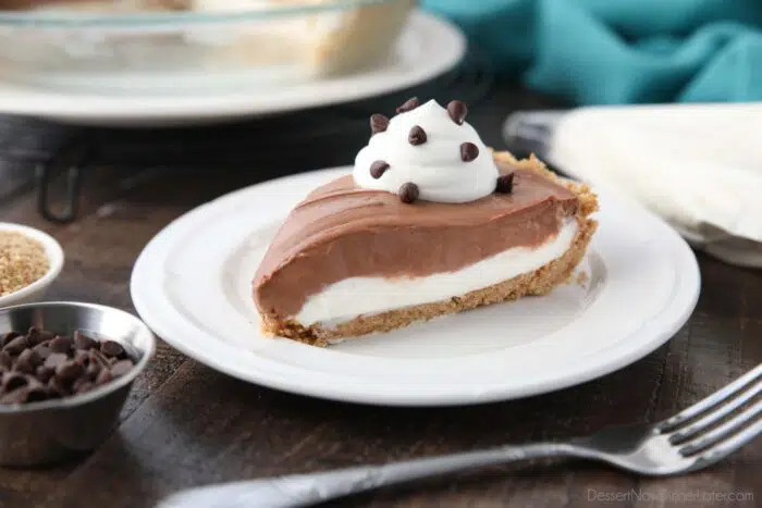 Slice of no bake chocolate vanilla cheesecake on a plate.