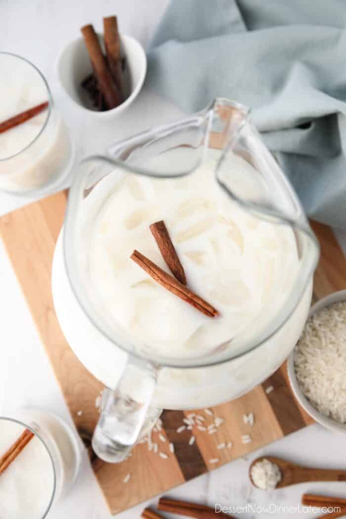 Top view of a pitcher of cinnamon rice milk.