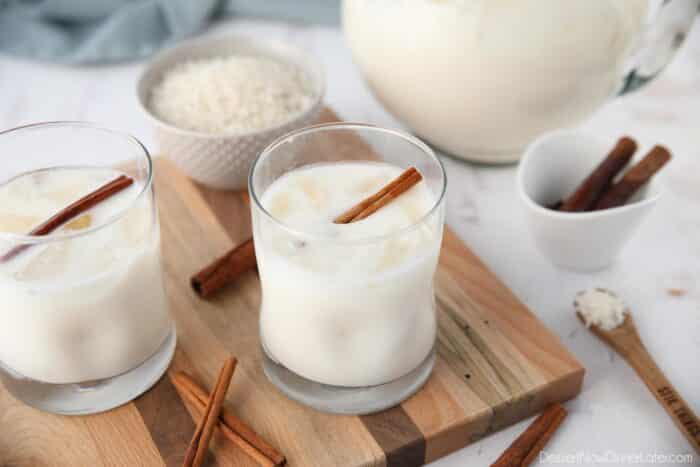 Glasses of horchata made with rice and cinnamon sticks.