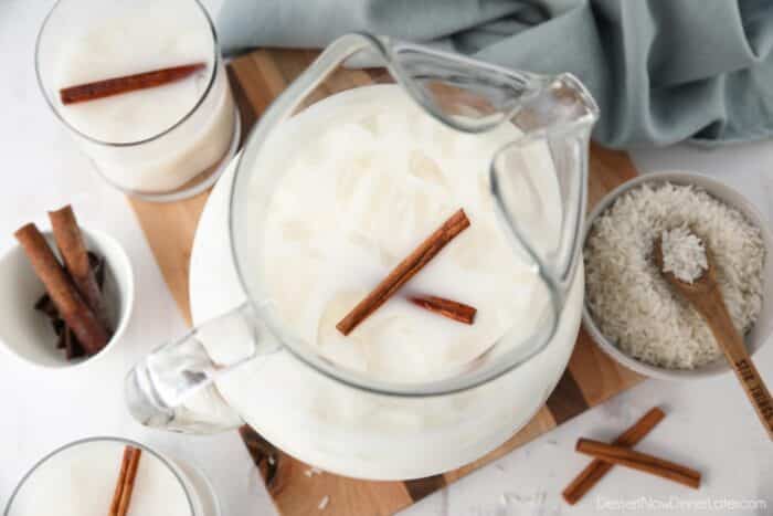 Top view of a pitcher of horchata (cinnamon rice milk).