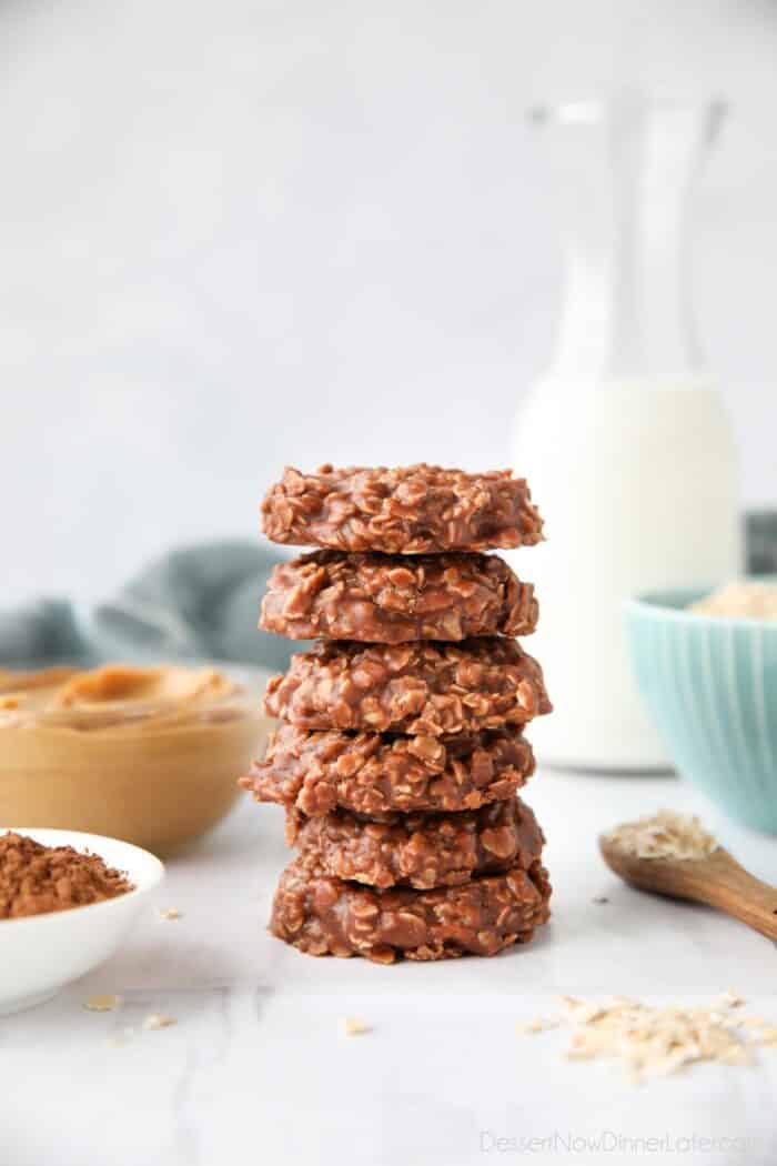Easy no bake cookies made with peanut butter and chocolate stacked high.