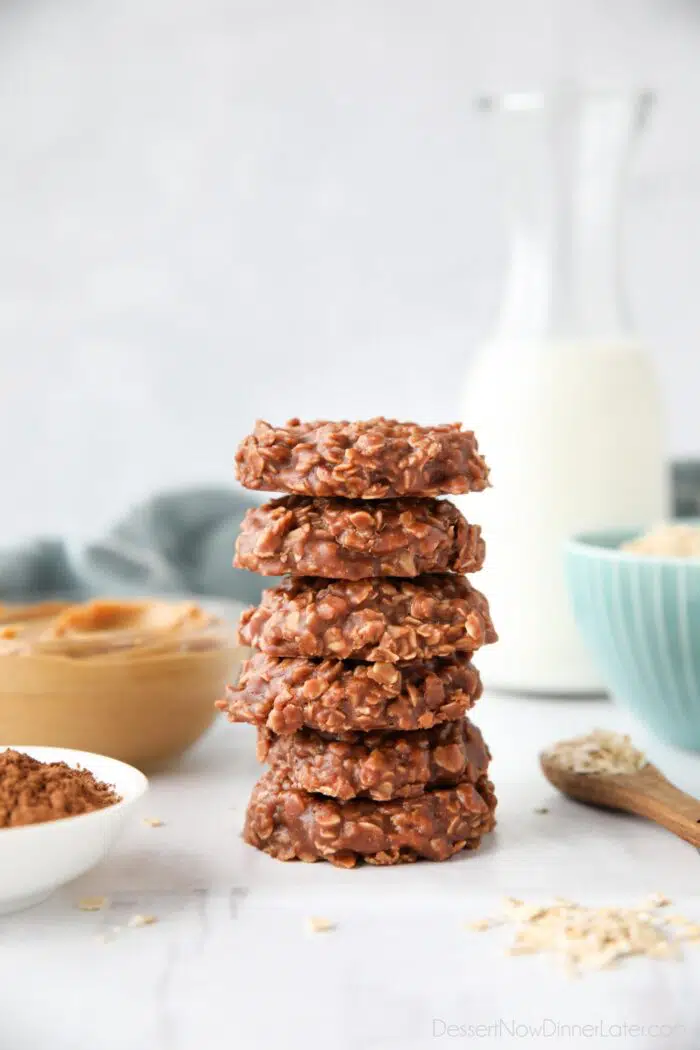 Easy no bake cookies made with peanut butter and chocolate stacked high.