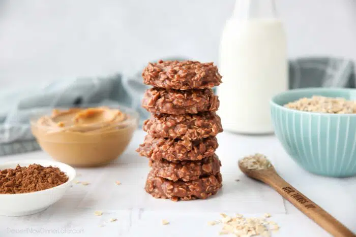 Chocolate peanut butter no bake cookies stacked on top of each other.