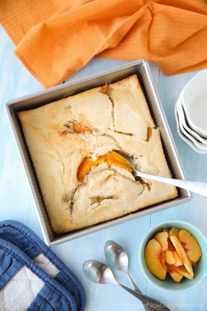 Baked peach cobbler made with canned peaches.