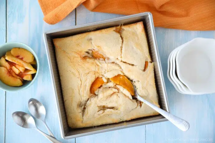 Baked peach cobbler made with canned peaches.