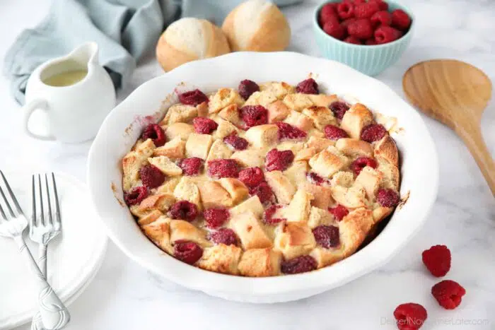 Baked Raspberry Bread Pudding in a round baking dish.