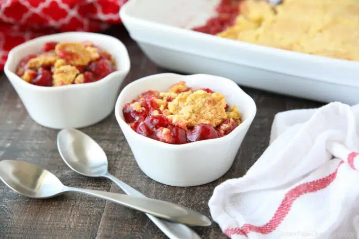 Bowls full of easy cherry dump cake.