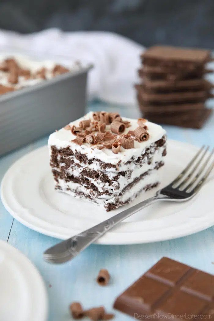 Slice of chocolate icebox cake on a plate.