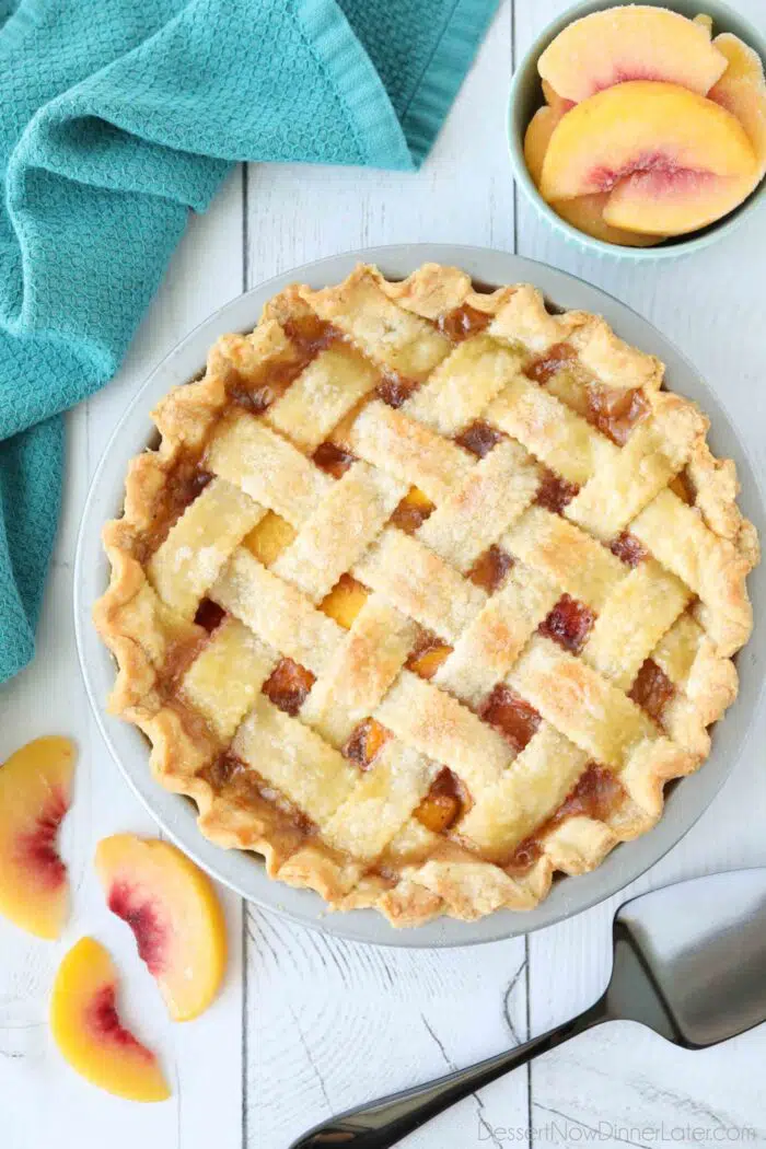 Top view of lattice crust on a peach pie.