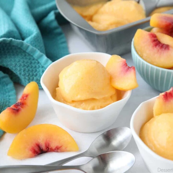 Three ingredient peach sorbet scooped into individual dishes.