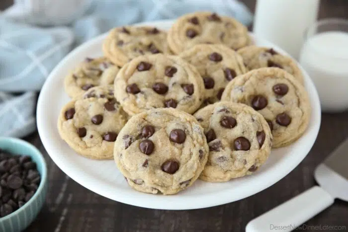 Soft and chewy chocolate chip cookies on a plate.