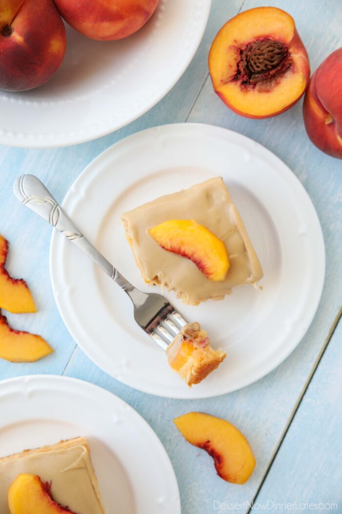 Top view of brown sugar peach cake on a plate.
