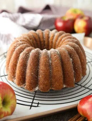 Apple Cider Donut Cake after being baked in a bundt pan and sprinkled with cinnamon-sugar..