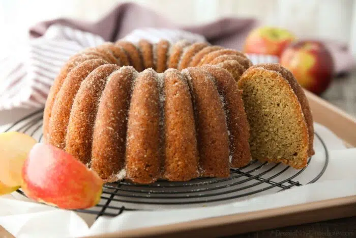 Slice being removed from the apple cider donut cake.