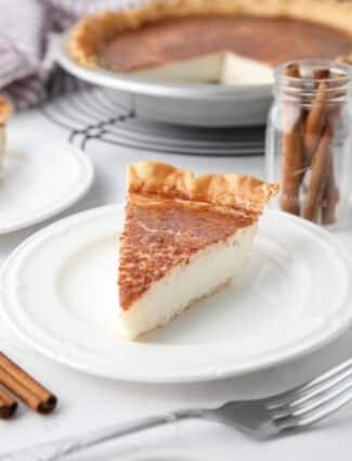 Slice of Sugar Cream Pie on a plate.