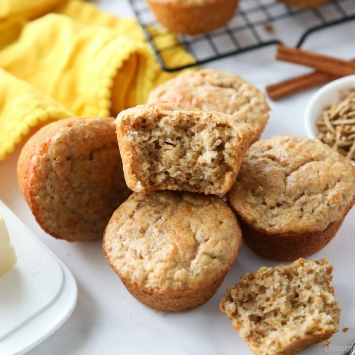Muffins made with All-Bran cereal, with one muffin showing the light and fluffy interior texture.
