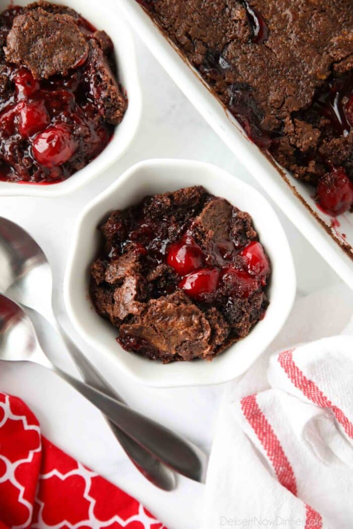 Warm chocolate cherry dump cake in a small bowl.