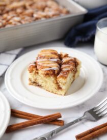 A fluffy vanilla cake filled with cinnamon swirls just like a cinnamon roll.