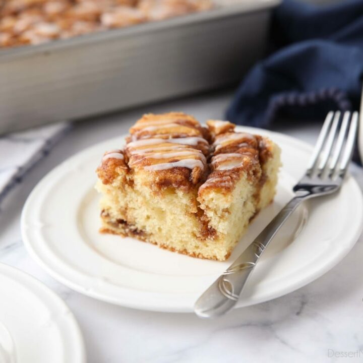 A fluffy vanilla cake filled with cinnamon swirls just like a cinnamon roll.