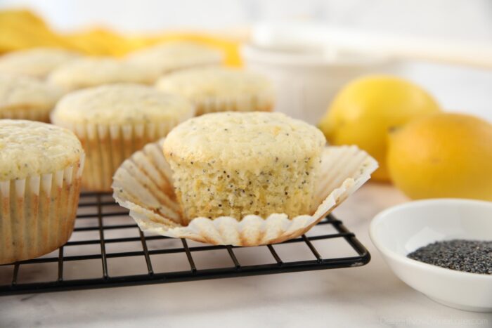 Lemon poppy seed muffin with the wrapper pulled down.