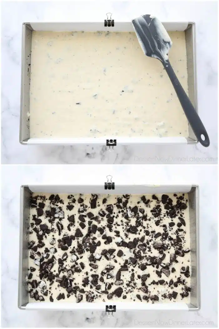 Oreo cheesecake batter in rectangular pan, then topped with more crushed Oreos.