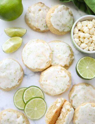 Key Lime Cookies with white chocolate chips topped with a lime glaze.