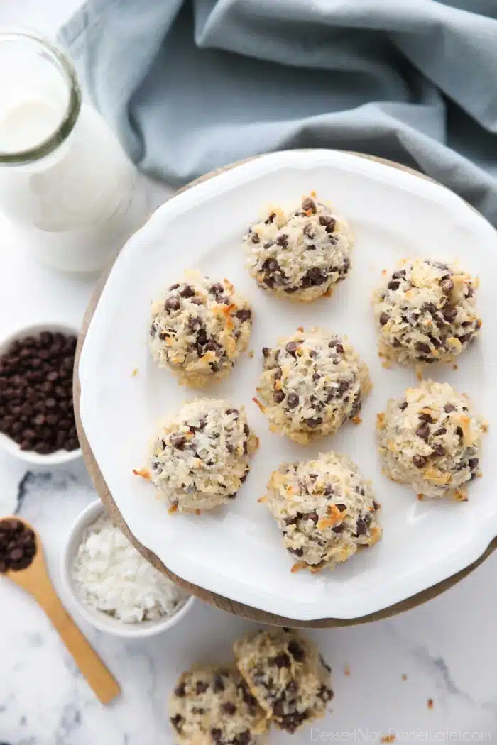 Plate of coconut macaroons with condensed milk and mini chocolate chips.