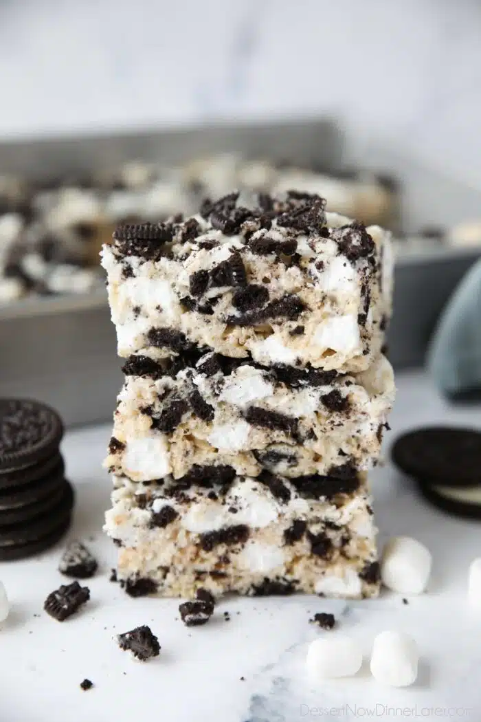 Stack of Oreo rice krispie treats with extra marshmallows and chunks of Oreo cookies.