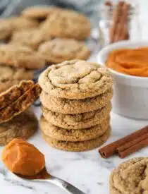 Stack of pumpkin gingersnap cookies.