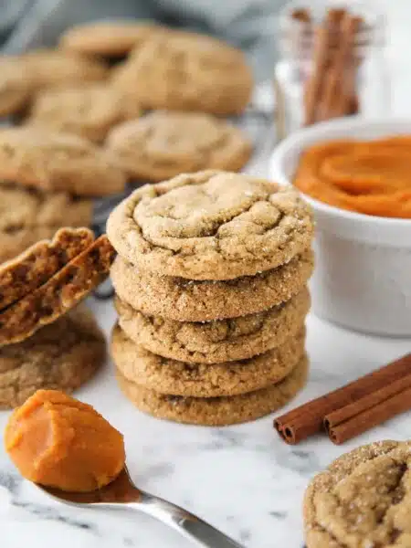 Stack of pumpkin gingersnap cookies.