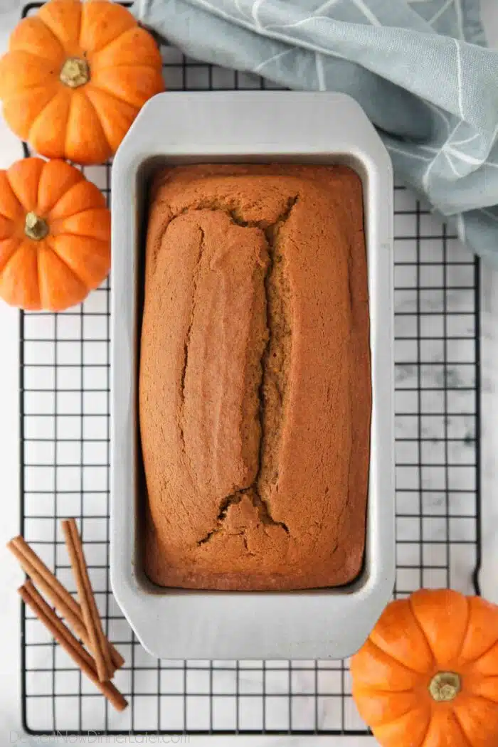 Baked pumpkin loaf in a pan.