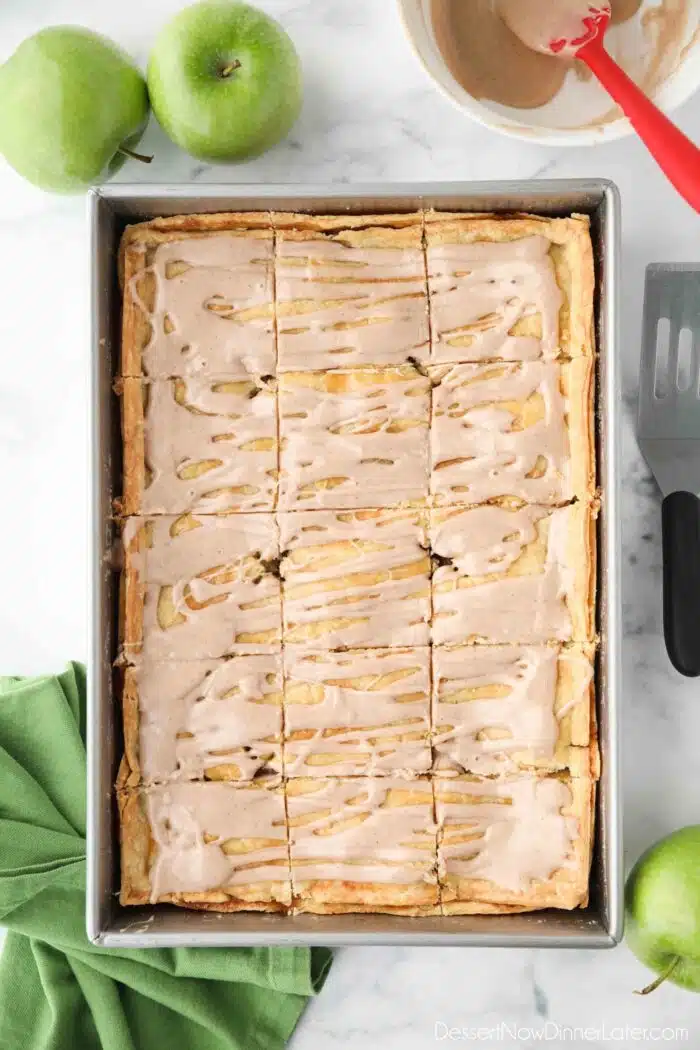 Apple Slab pie in a 9x13 inch pan with maple glaze on top.