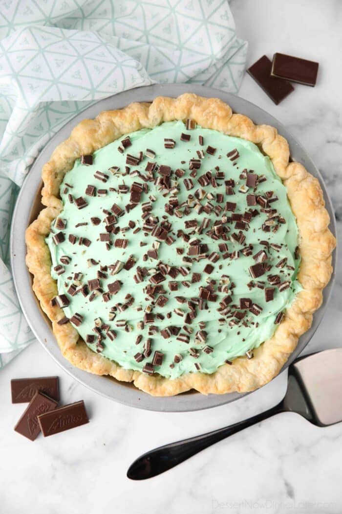Top view of chocolate mint pie with chopped pieces of Andes mints on top.